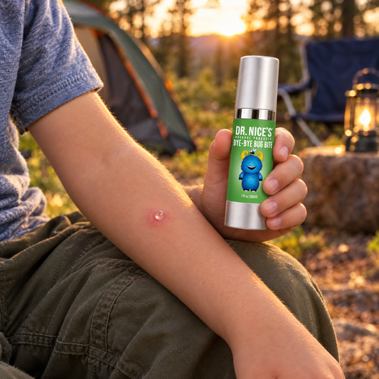 One dot of Bye-Bye Bug Bite on a bug bite at a campsite, bottle in hand