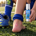 One pearl-sized dot of Kids Sports Gel on a blister on a kid's heel at soccer